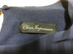 エアークローゼットの3箱目で届いたフェミニンなブラウスのブランド「CLEAR IMPRESSION」のタグ写真